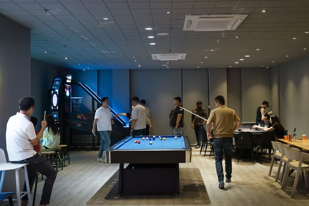 Guests playing snooker at Nest 2 private event space Social Nest Singapore