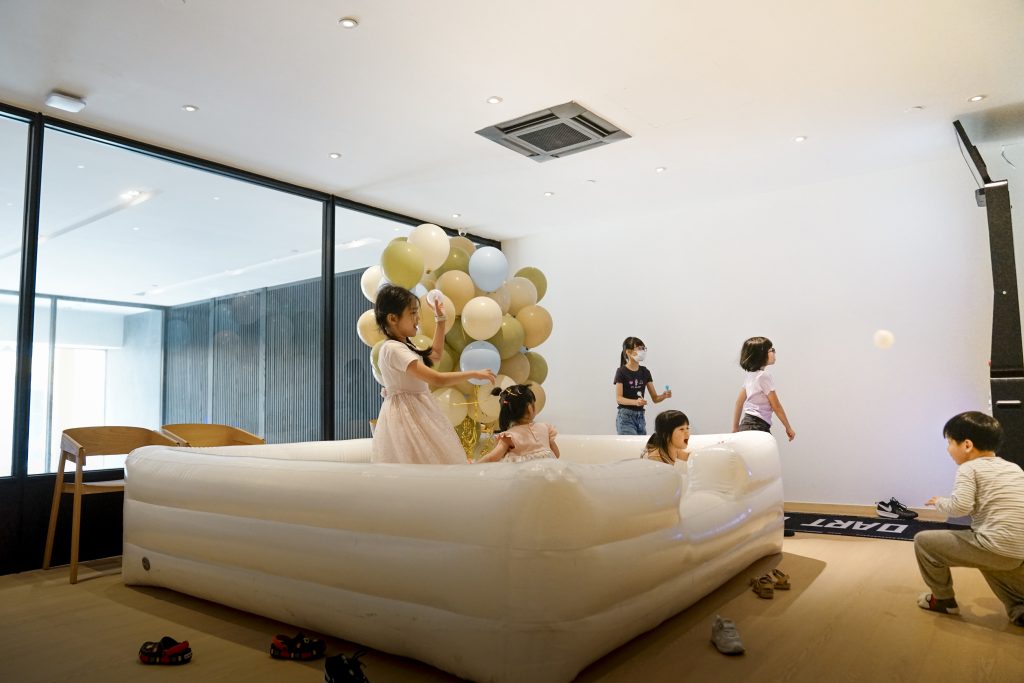 Guests celebrating a baby shower at Nest 1 private event space Singapore