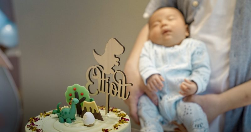 Baby with cake celebrating a baby shower at Nest 1 private event space Singapore